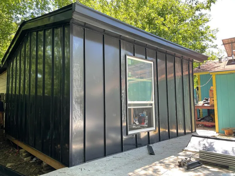 Black standing seam metal wall panels for Metal Roof Installation in Huron